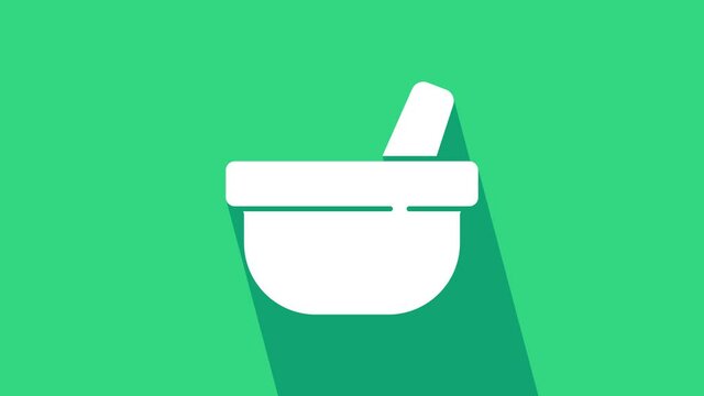 White Mortar and pestle icon isolated on green background. 4K Video motion graphic animation