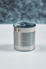Closed tin can on a white background