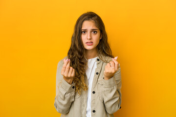 Young caucasian woman showing that she has no money.