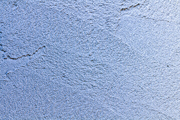 Abstract Wide Angle light blue stucco Background. Wall building Close up. Rough Surface plaster Texture With Copy Space for design.