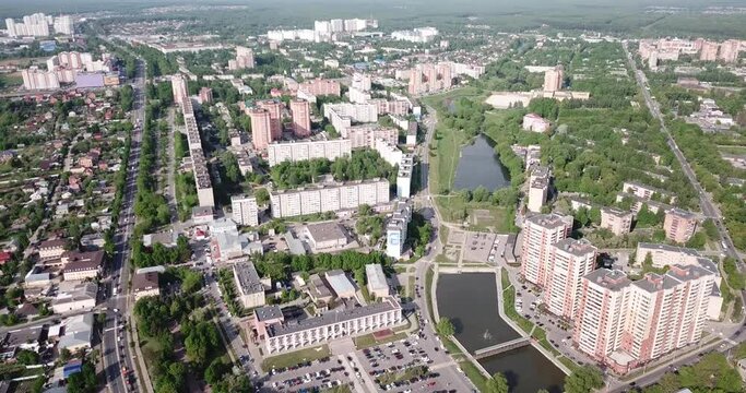 Aerial view of modern residential areas of Chekhov city in sunny spring day, Russia