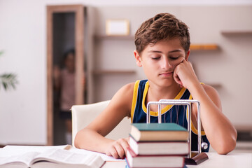 Schoolboy and his small sister staying at home during pandemic