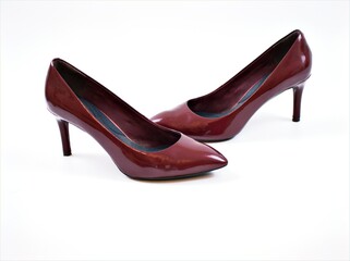 pair of female shoes ,Shiny red woman shoes isolated on white background	