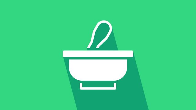 White Mortar and pestle icon isolated on green background. 4K Video motion graphic animation