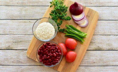 Whole organic fresh ingredients for making homemade tasty healthy vegetarian hearty one pot winter comfort chillis, soups and stews