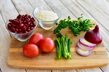 Whole organic fresh ingredients for making homemade tasty healthy vegetarian hearty one pot winter comfort chillis, soups and stews