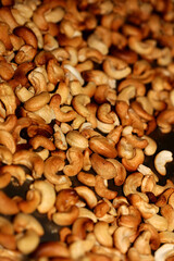 Backed cashews close up background modern high quality prints Anacardium occidentale family anacardiaceae