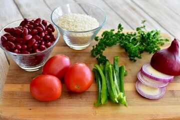 Whole organic fresh ingredients for making homemade tasty healthy vegetarian hearty one pot winter comfort chillis, soups and stews