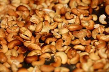 Backed cashews close up background modern high quality prints Anacardium occidentale family anacardiaceae