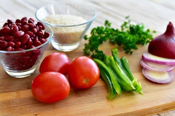 Whole organic fresh ingredients for making homemade tasty healthy vegetarian hearty one pot winter comfort chillis, soups and stews