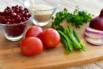 Whole organic fresh ingredients for making homemade tasty healthy vegetarian hearty one pot winter comfort chillis, soups and stews