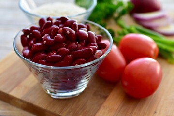 Whole organic fresh ingredients for making homemade tasty healthy vegetarian hearty one pot winter comfort chillis, soups and stews