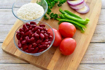 Whole organic fresh ingredients for making homemade tasty healthy vegetarian hearty one pot winter comfort chillis, soups and stews