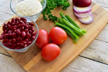 Whole organic fresh ingredients for making homemade tasty healthy vegetarian hearty one pot winter comfort chillis, soups and stews