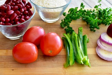 Whole organic fresh ingredients for making homemade tasty healthy vegetarian hearty one pot winter comfort chillis, soups and stews