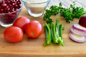 Whole organic fresh ingredients for making homemade tasty healthy vegetarian hearty one pot winter comfort chillis, soups and stews