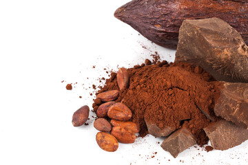 Cocoa beans with cocoa powder, cocoa pieces and cacao pod isolated on a white background. Macro photography.
