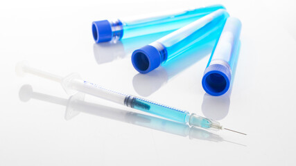 Disease outbreak. Medical syringe with needle for protection flu virus and coronavirus. Covid...