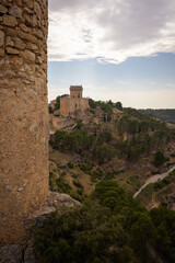 Landscape with the fortified city of Alarcon with its watchtowers and the castle on top of the hill...