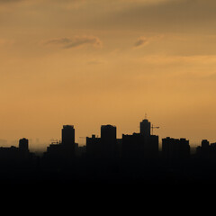 Fototapeta na wymiar city silhouette at sunrise