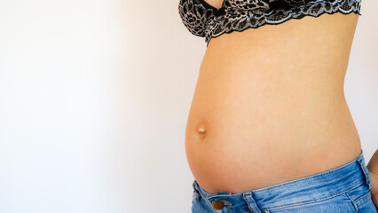 View of a pregnant woman's tummy