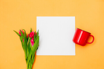 Square mockup banner and tulips with cup of coffee on yellow background