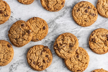 freshly baked Chocolate chip cookies on a marble countertop. Copy space.