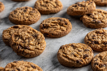 freshly baked Chocolate chip cookies on a marble countertop. Copy space.