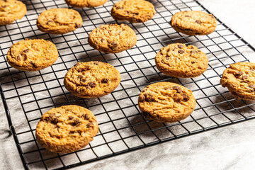 freshly baked Chocolate chip cookies on a marble countertop. Copy space.