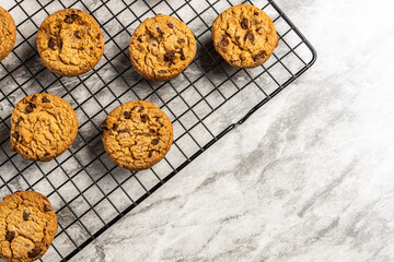 freshly baked Chocolate chip cookies on a marble countertop. Copy space.