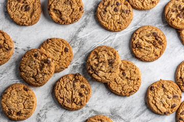 freshly baked Chocolate chip cookies on a marble countertop. Copy space.