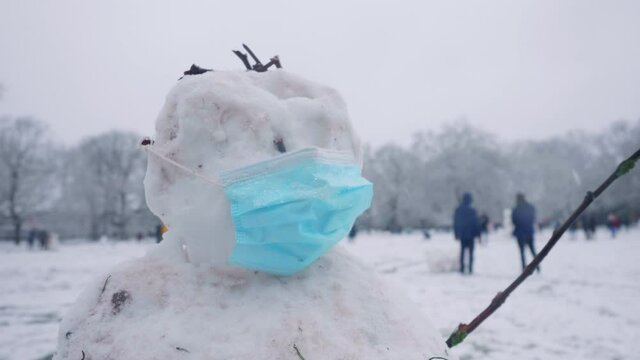 Close up of a snowman during the corona pandemic in London.