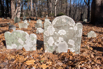 Details of Headstones at Sawyer Hill Buying Ground, Newburyport MA. Built in 1695. Beautifully carved gravestone from the 1700's close up. Historic site.