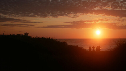 Beautiful beach of Salinas - Ecuador at sunset in summer - red sunset - La chocolatera.
