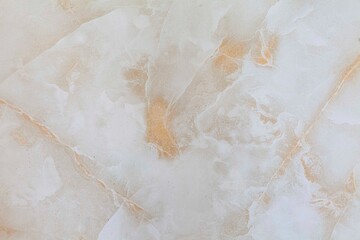 Fototapeta na wymiar Cracked brown stone marble wall texture and seamless background