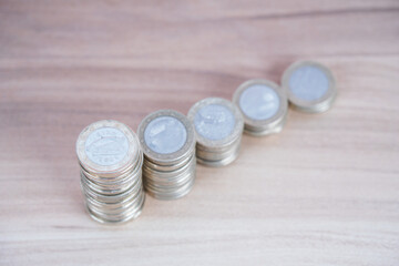 Looking down on a falling euro coin