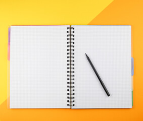 opened exercise book with felt-tip pen, empty place for text