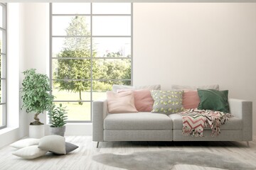 White living room with sofa and summer landscape in window. Scandinavian interior design. 3D illustration