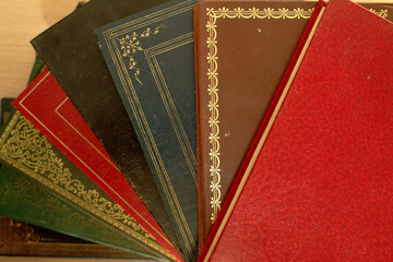 Fototapeta premium Many books side by side on the table 