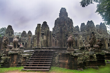 Fototapeta na wymiar Bayon the central temple of Angkor Thom, late 12th century.It rains in the rainy season. (Cambodia, 04.10. 2019)