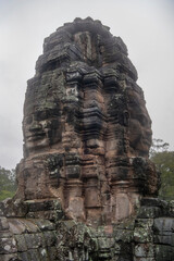  Bayon the central temple of Angkor Thom, late 12th century. It rains in the rainy season....