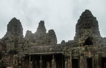  Bayon the central temple of Angkor Thom, late 12th century. It rains in the rainy season....