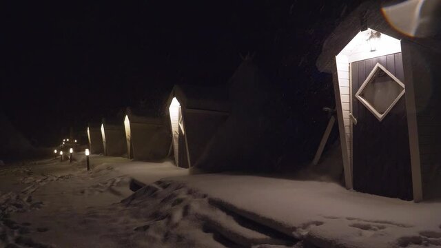 Typical cabins of Finland with wooden doors in the silent night.