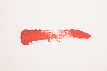 Pale pink lip gloss marks all on white paper. Pictures for female cosmetics