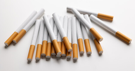 Many cigarettes stacked together. Drugs are harmful to the respiratory system.