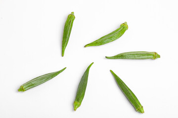 Fresh young okra isolated on white background