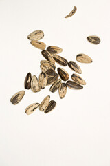 Baked Sunflower Seeds Sitting On White Background