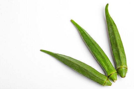 Fresh young okra isolated on white background