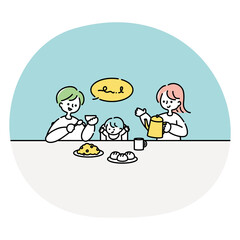 ご飯を食べる夫婦と赤ちゃん