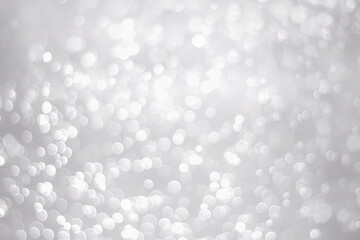White glitter vintage lights background. White bokeh background.